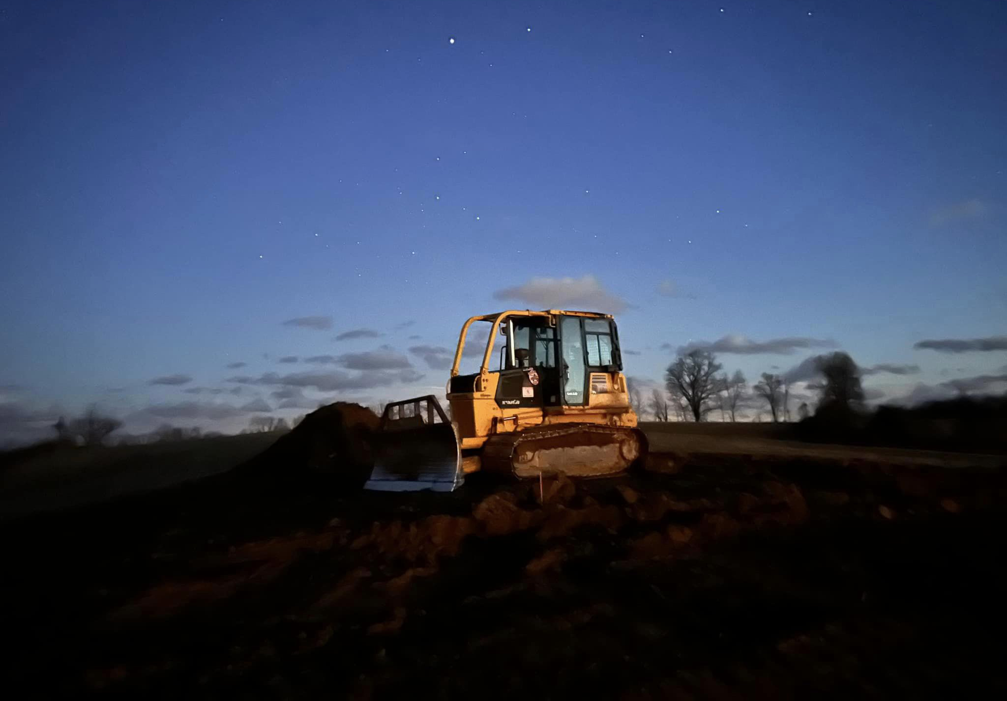 bulldozer at night