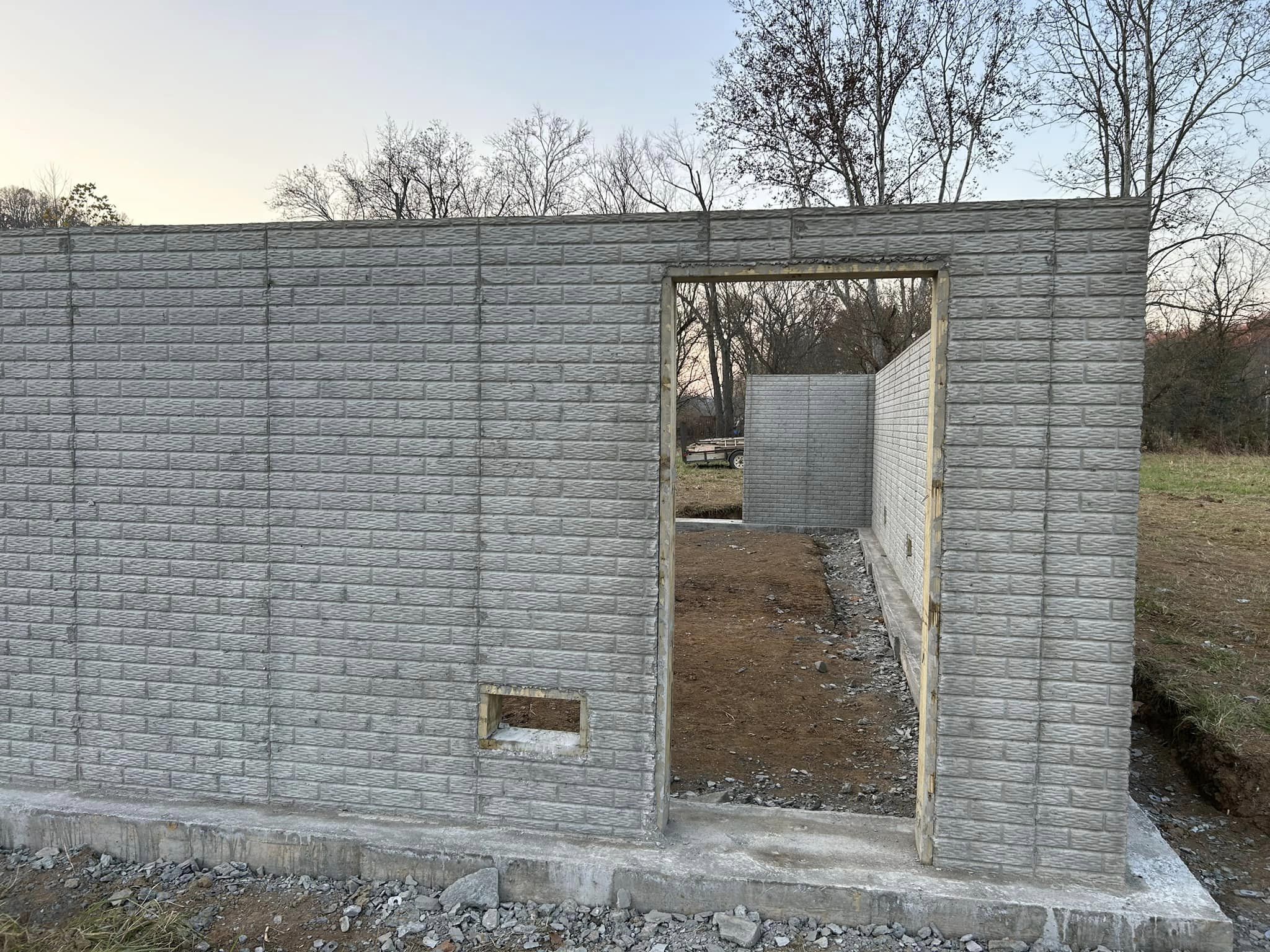 poured concrete walls with door opening