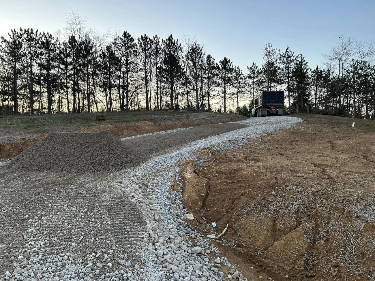 spreading gravel for driveway